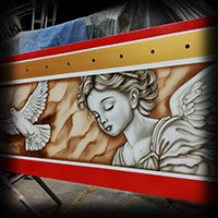 aniołki malowane aerografem na karuzeli