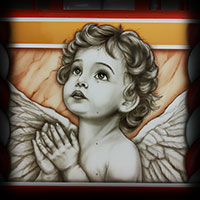 aniołek malowany aerografem na kasie do karuzeli